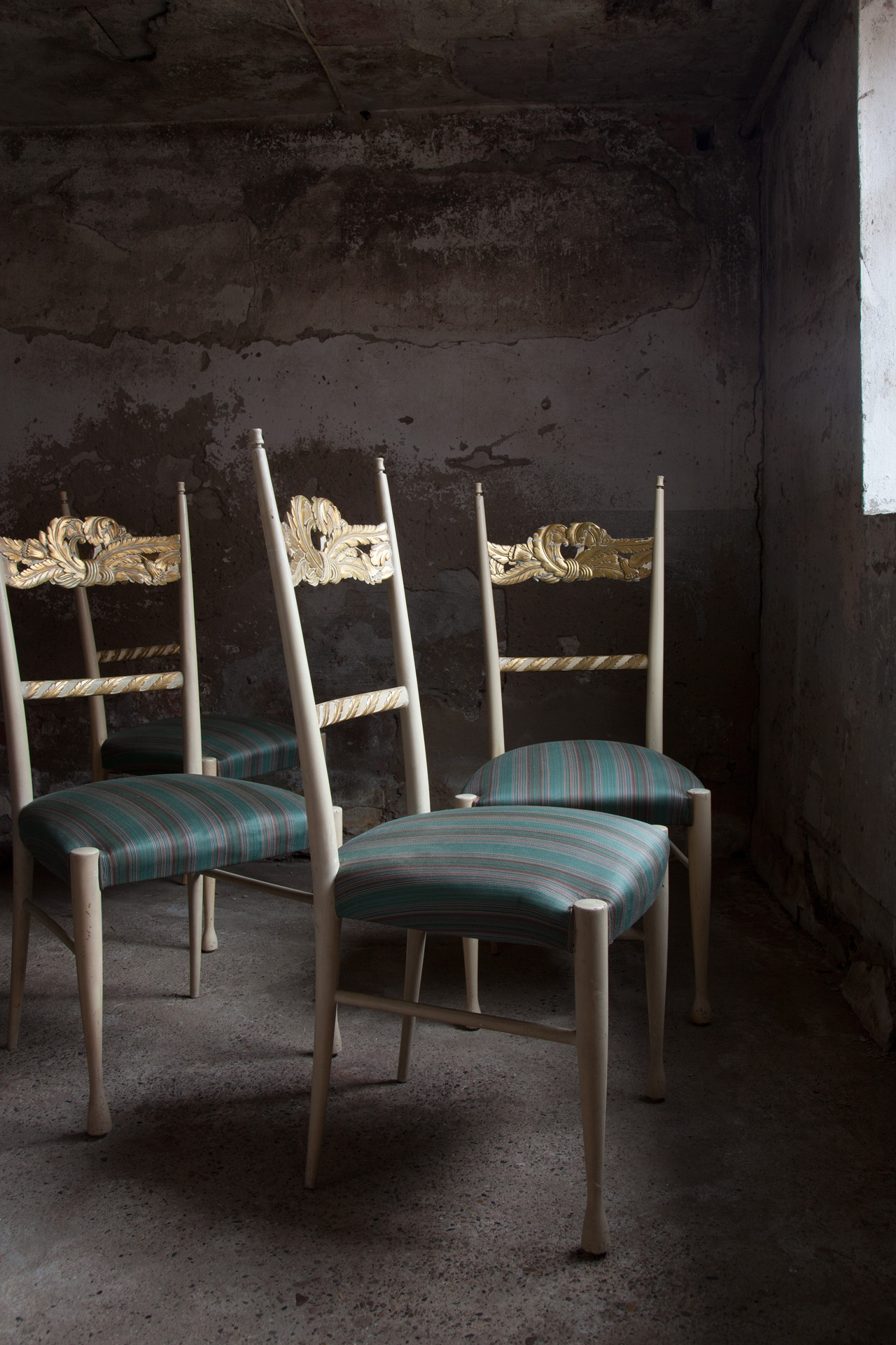 a set of four chairs by Paolo Buffa and Giovanni Gariboldi