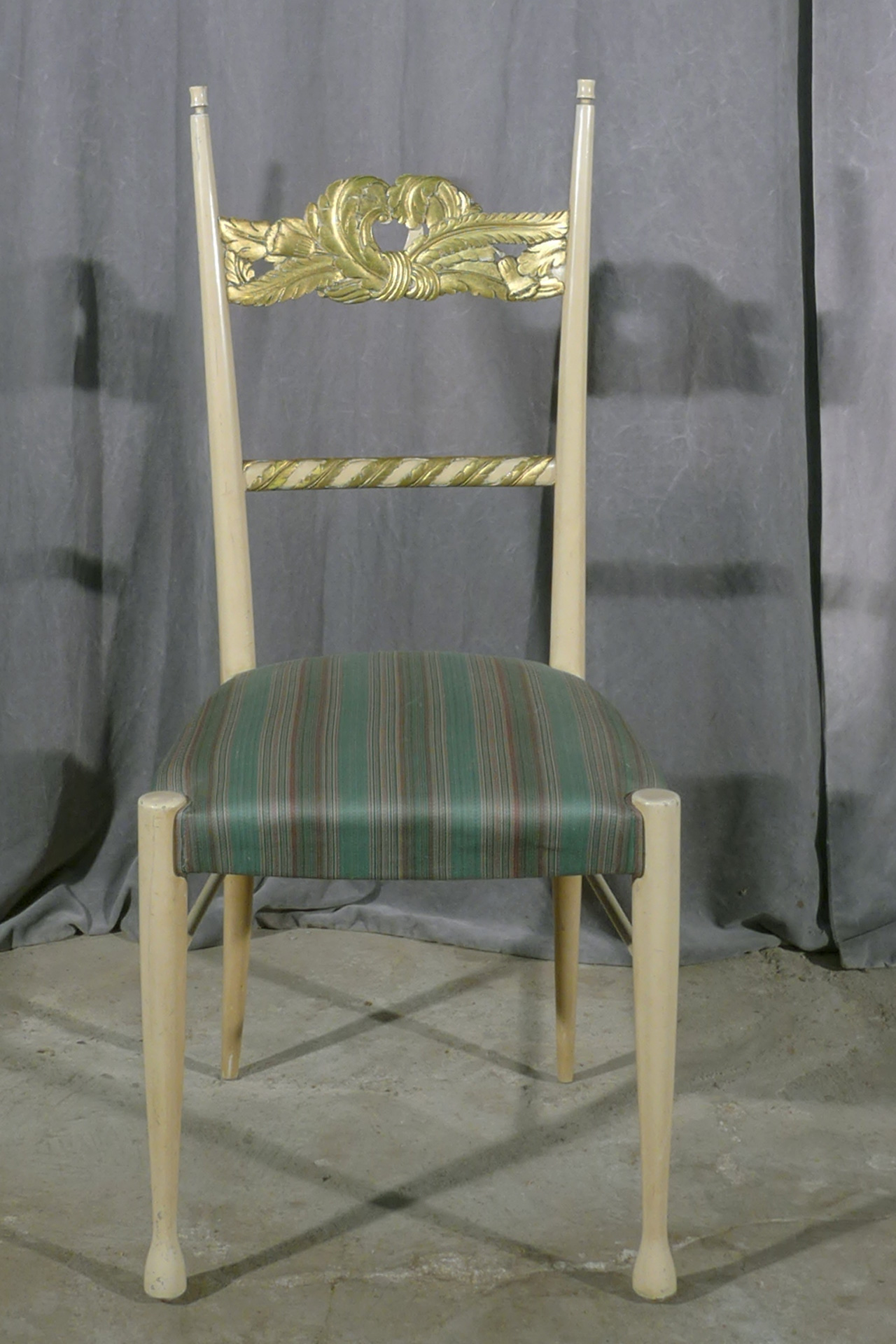 a set of four chairs by Paolo Buffa and Giovanni Gariboldi