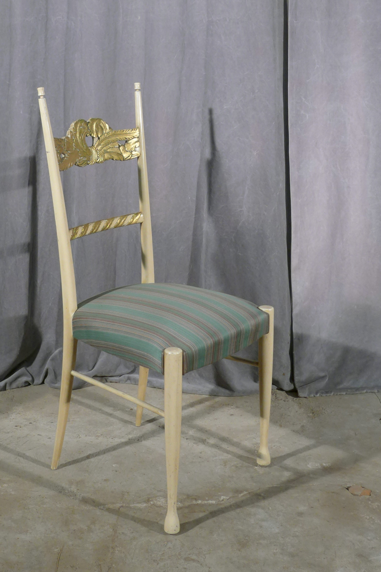 a set of four chairs by Paolo Buffa and Giovanni Gariboldi