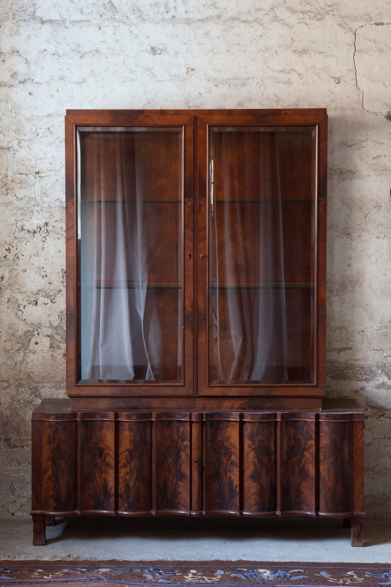 A display cabinet by Bruno Paul